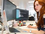 JS frameworks - A woman coding on computer